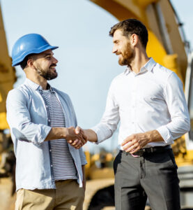 Rental Sales Rep and Customer Shaking Hands